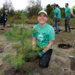 http://Excited%20Tree%20Canada%20staff%20posing%20near%20a%20newly%20planted%20tree.
